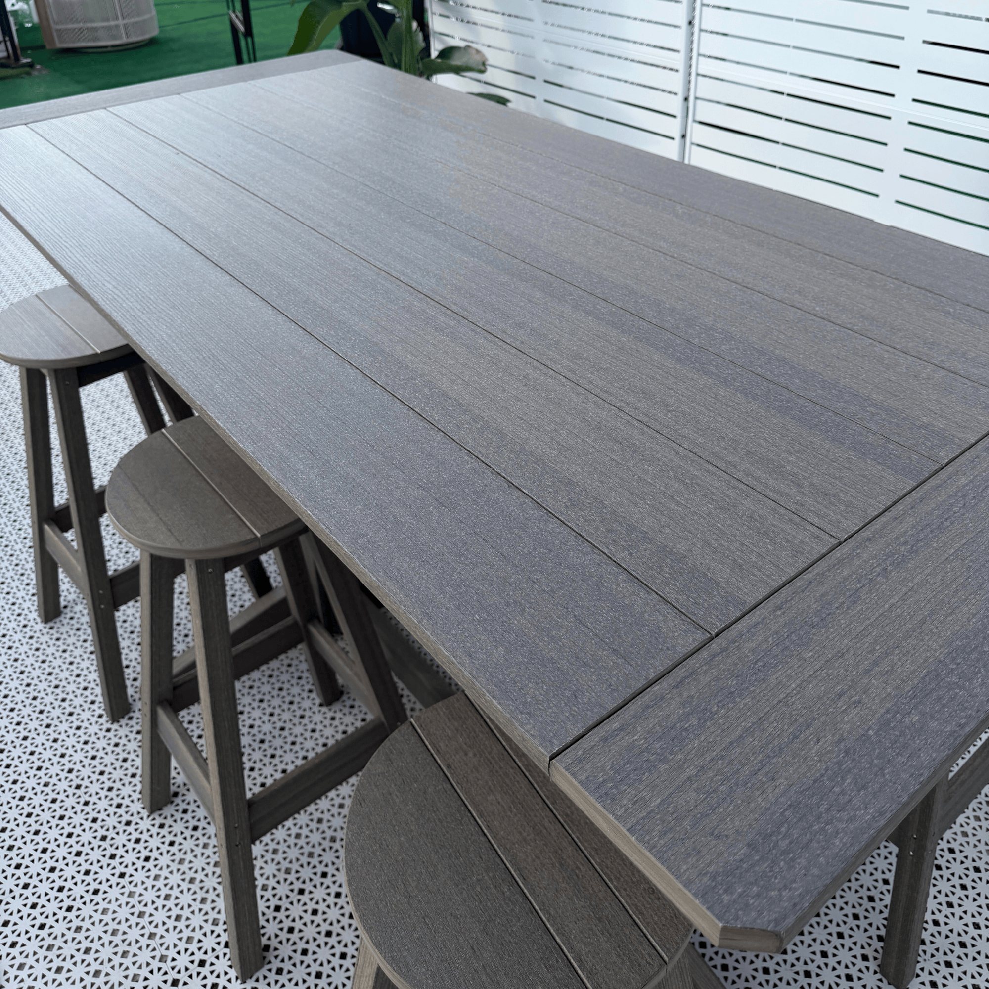 Detail shot of the Keystone Amish Co. Bar Height Poly Outdoor Dining Table, 6ft in Coastal Gray 