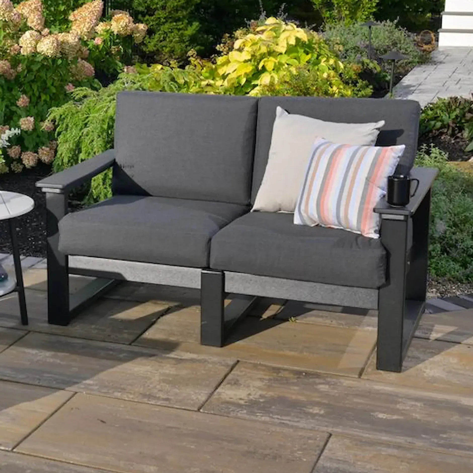 Lanai Loveseat in Black with Spectrum Carbon fabric